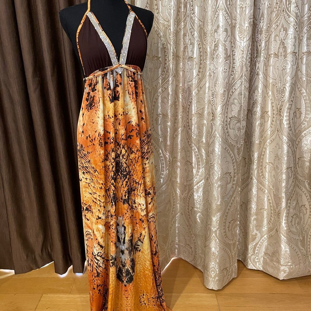 Long fancy dress with crystals with deep neckline